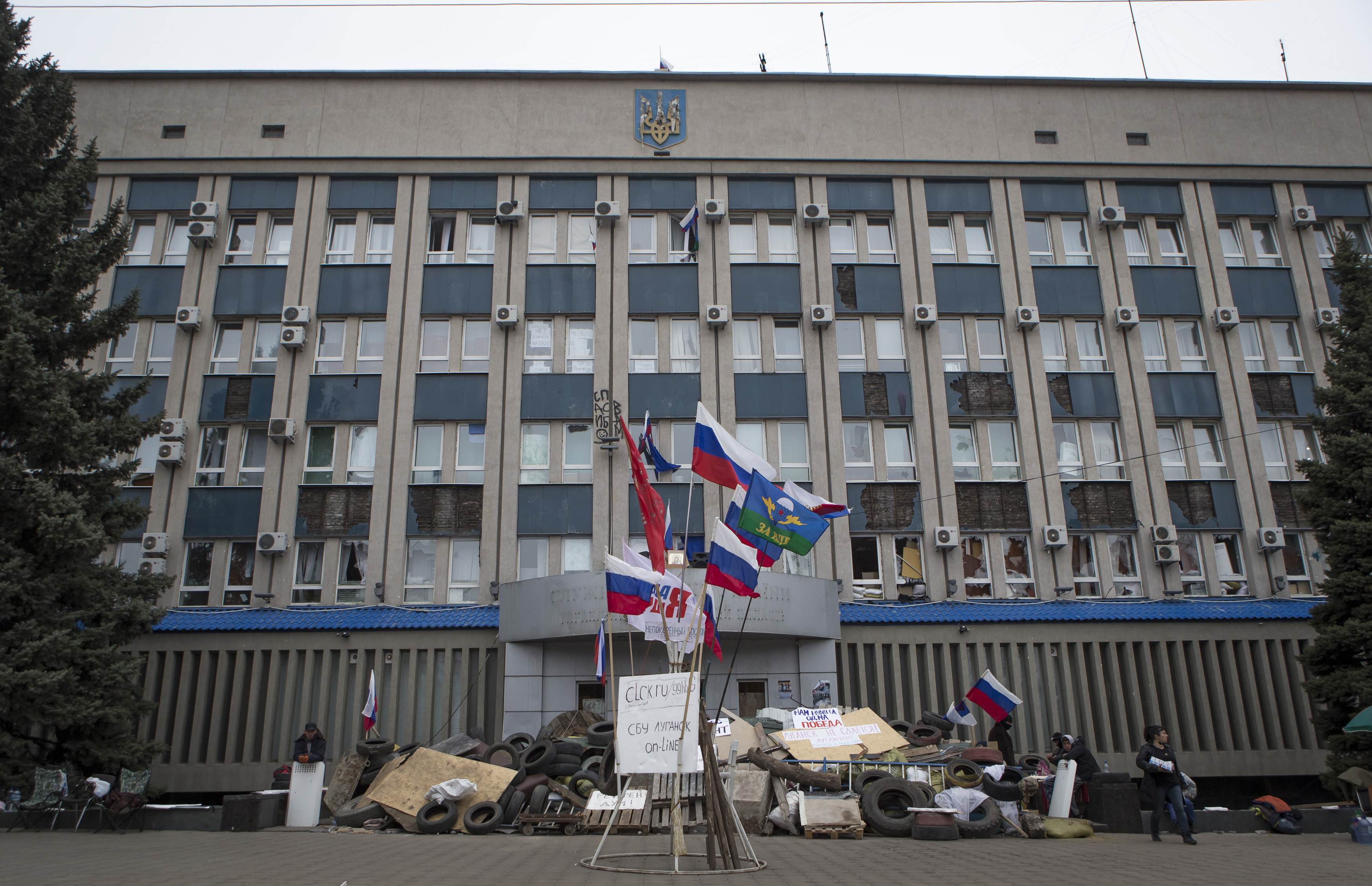 A barricade is set up in front of the seized SBU state security service in Luhansk, in eastern Ukraine